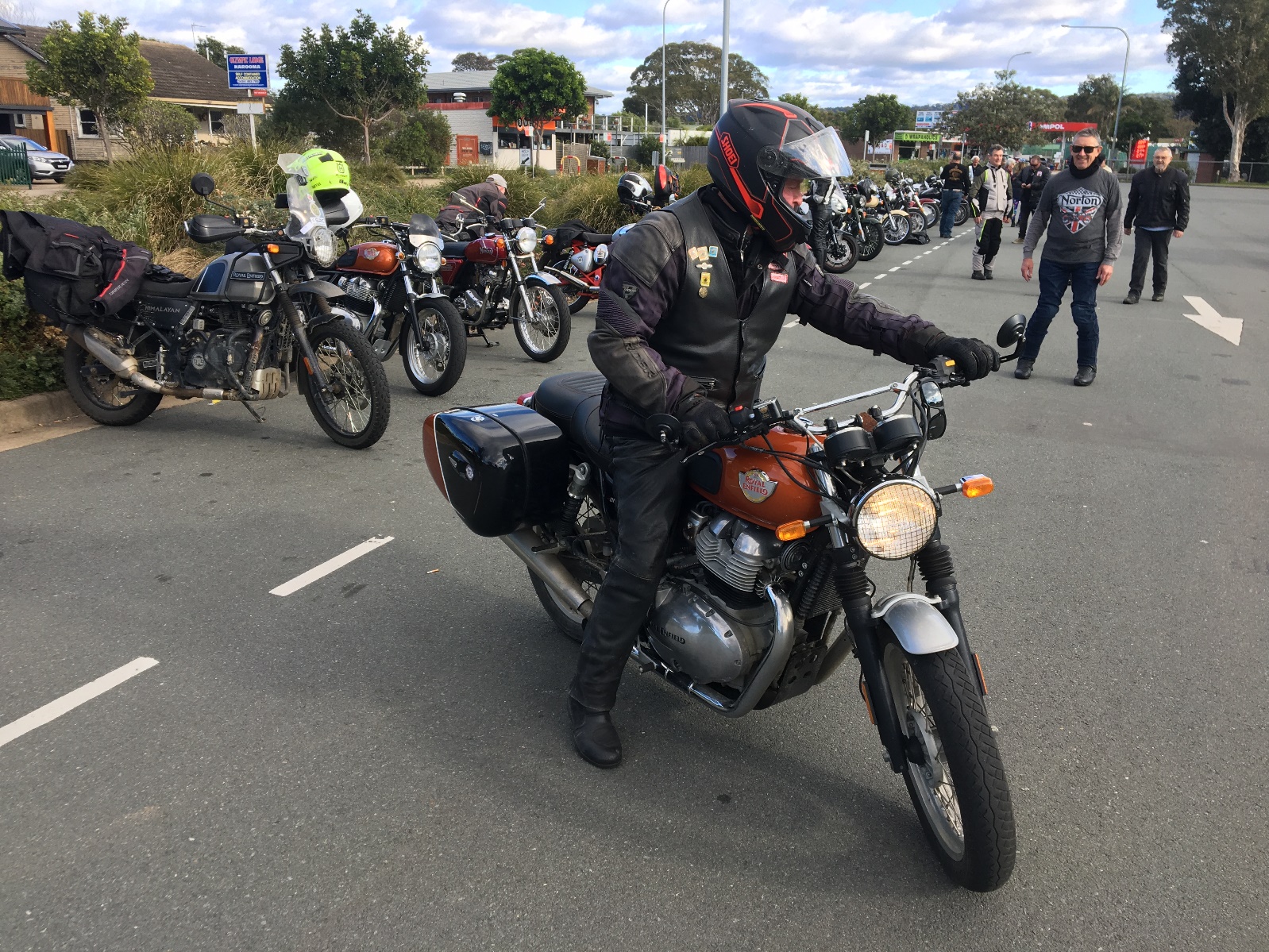A person on a motorcycle Description automatically generated with low confidence